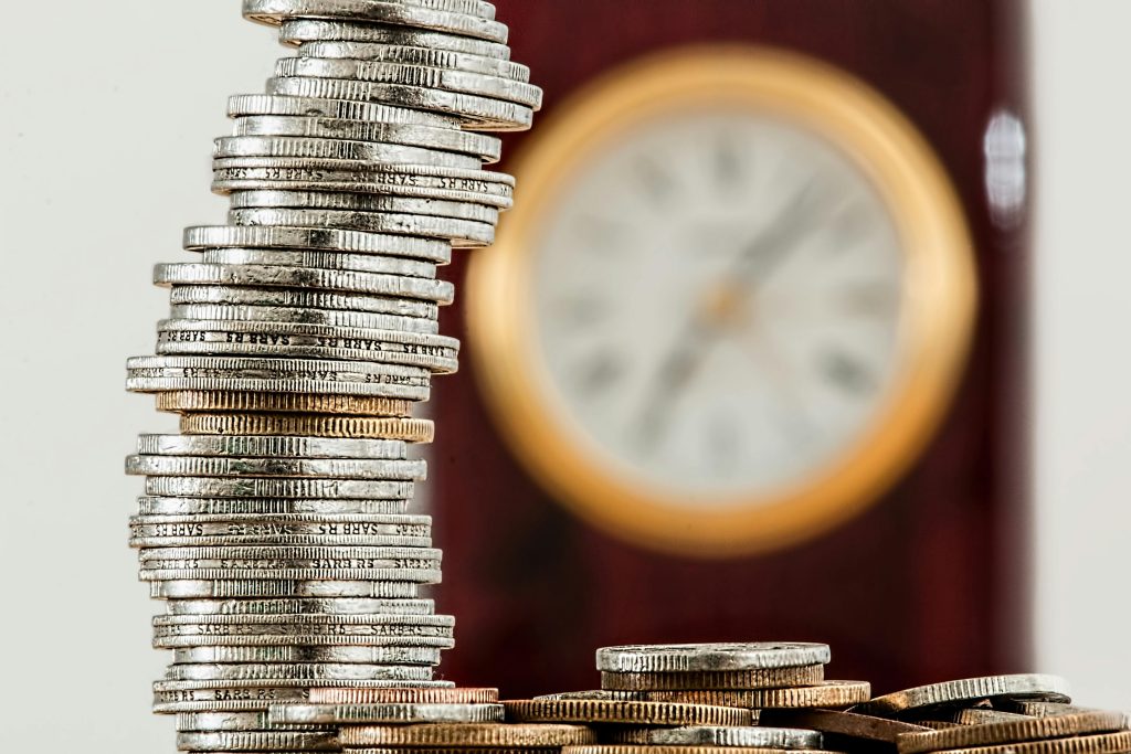 Stack of coins representing savings from using coupons