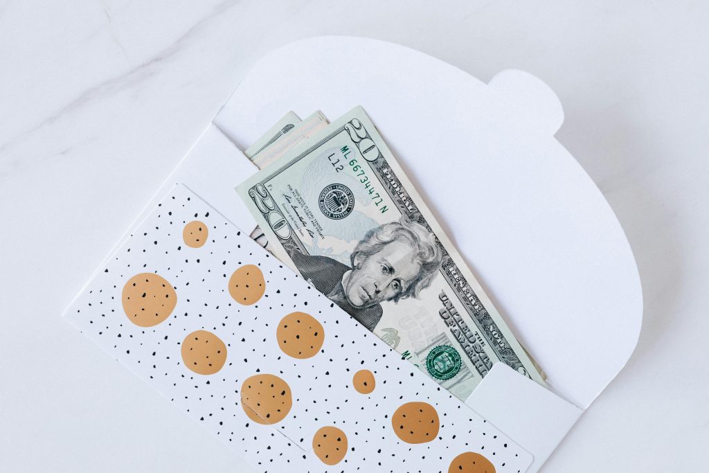 Cash envelope representing survey sign-up bonuses and payout rewards